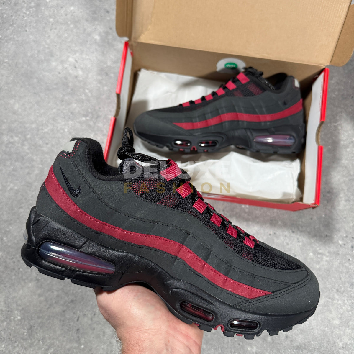 Nike Air Max 95 trainers in red/black