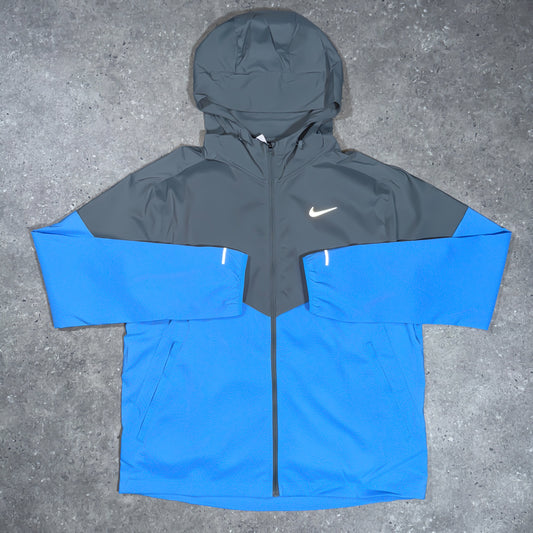 Nike light windbreaker (blue/grey)